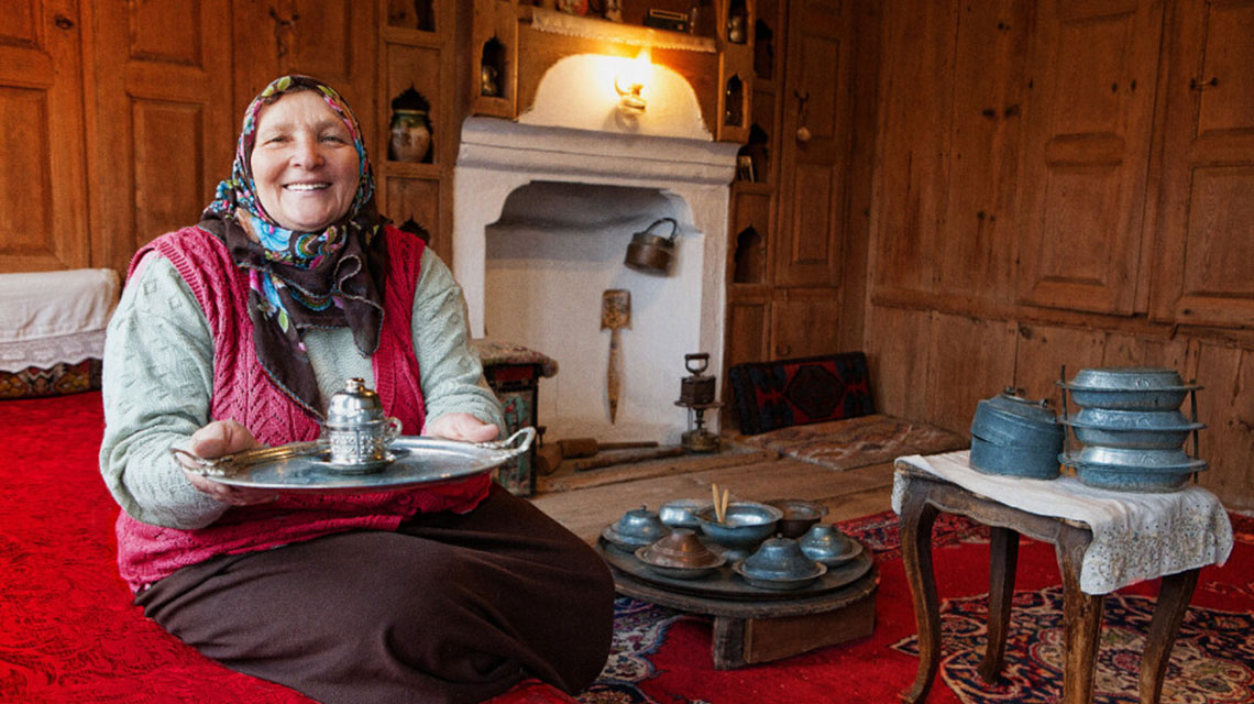 A Turkish village woman serving Turkish coffee in her traditional house, Safranbolu /N.W. Turkey