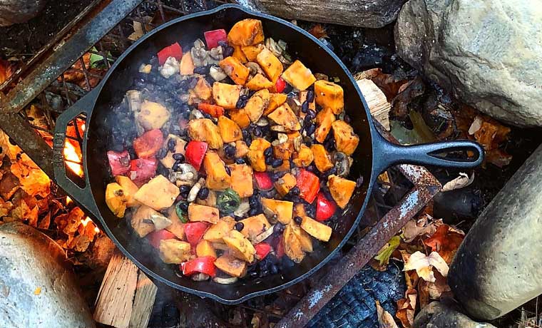 Camp cooking with legumes and potatoes